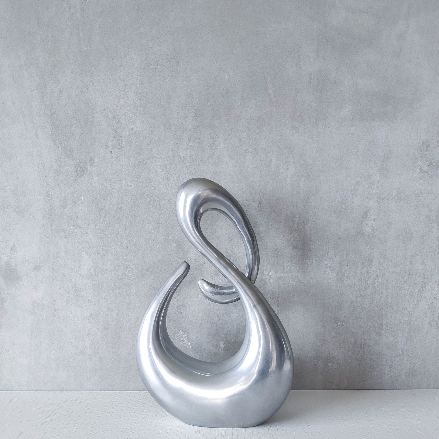 Vintage 00s sculptural sand cast aluminium sculpture wiggle twist