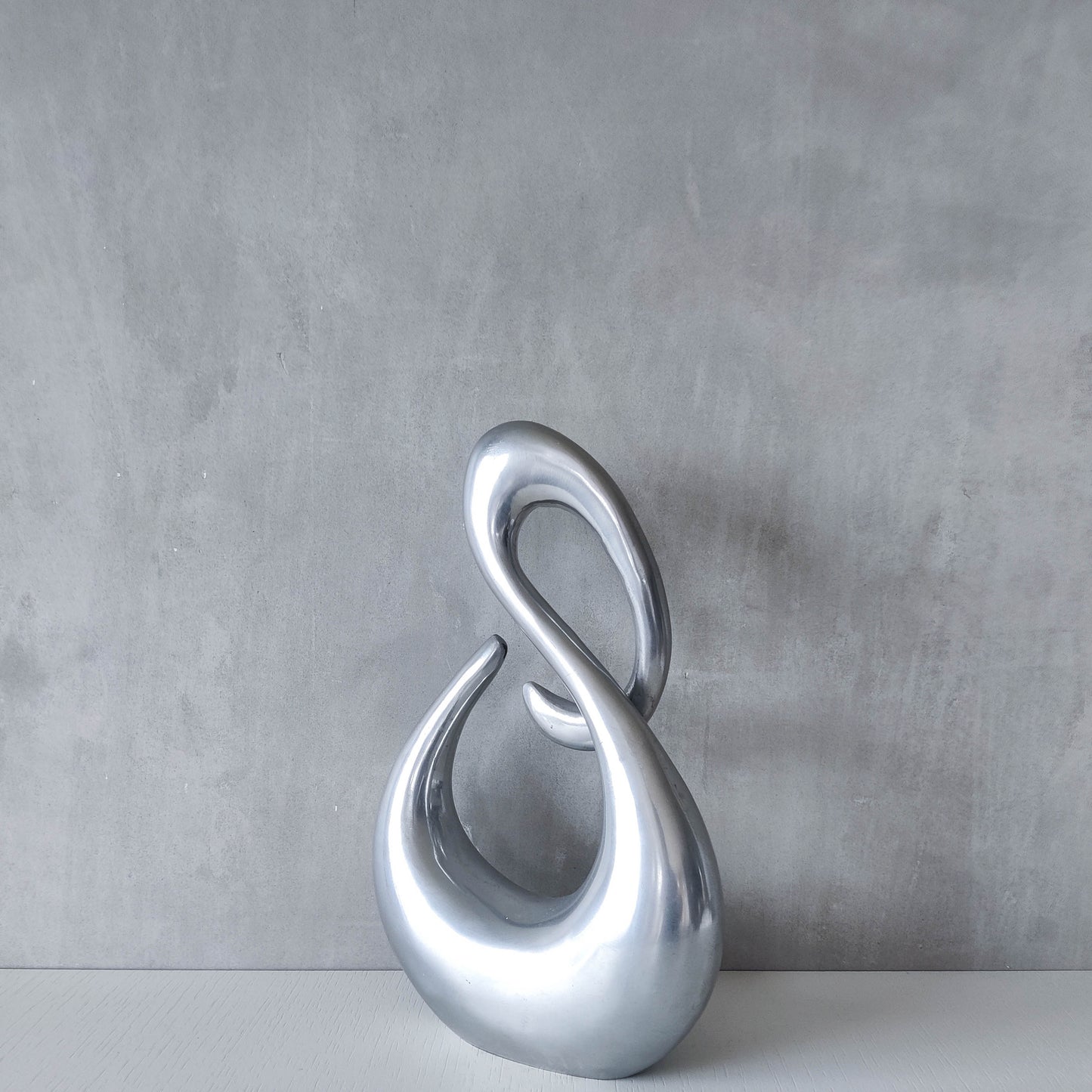 Vintage 00s sculptural sand cast aluminium sculpture wiggle twist