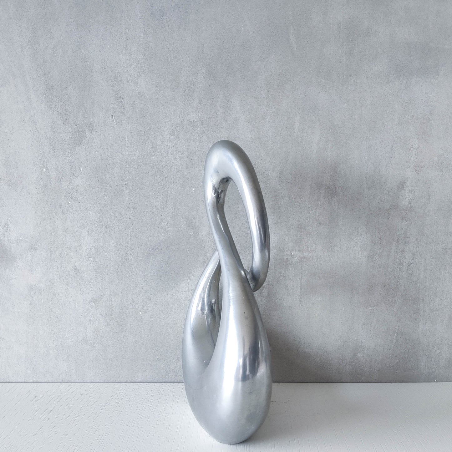 Vintage 00s sculptural sand cast aluminium sculpture wiggle twist