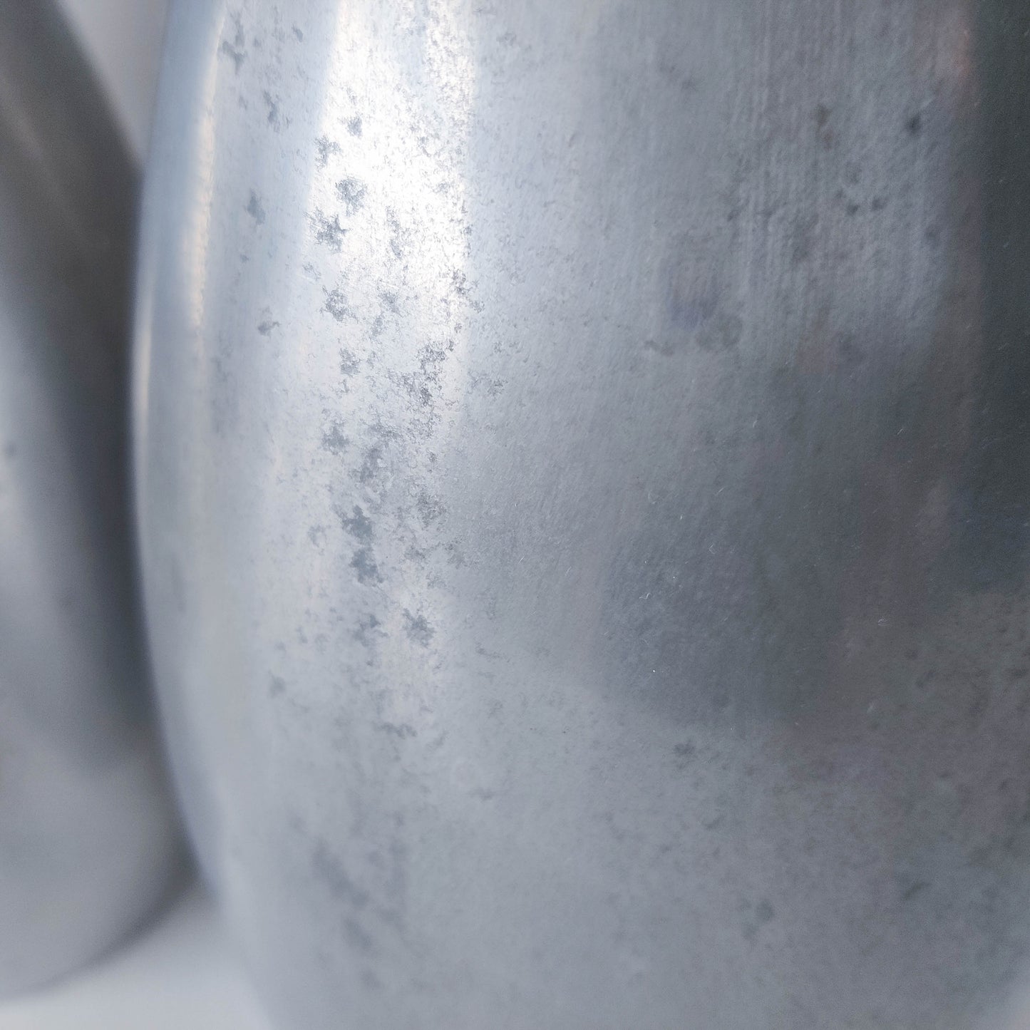 Pair of vintage cast aluminium modernist style sculptural bottles vases vessels 41cms