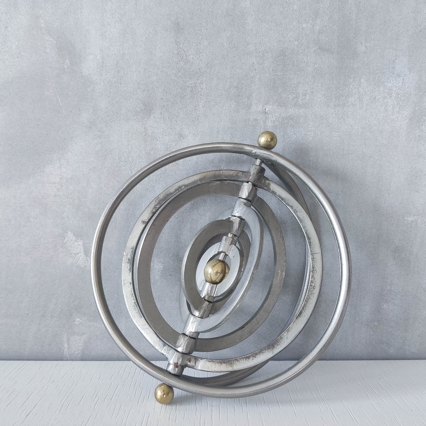 Vintage modernist style orb armillary sphere metal object table sculpture