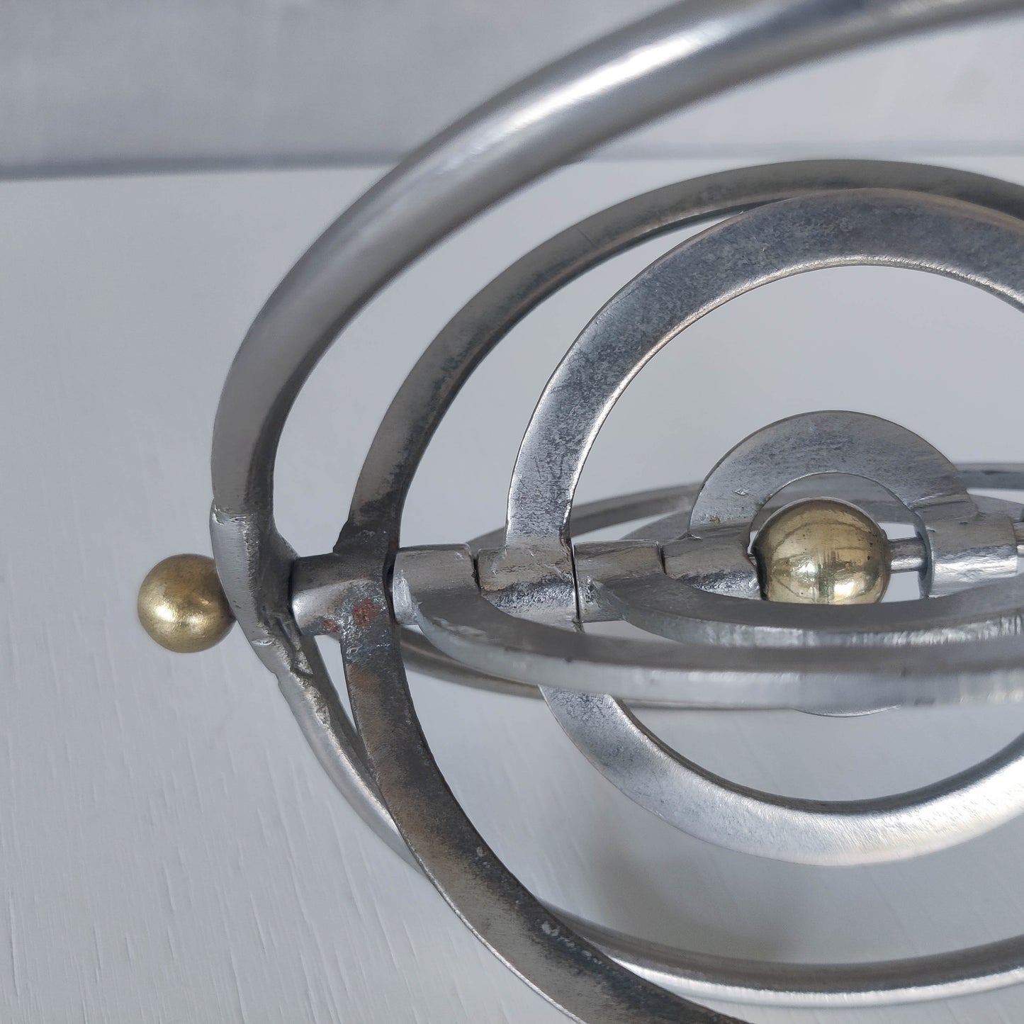 Vintage modernist style orb armillary sphere metal object table sculpture