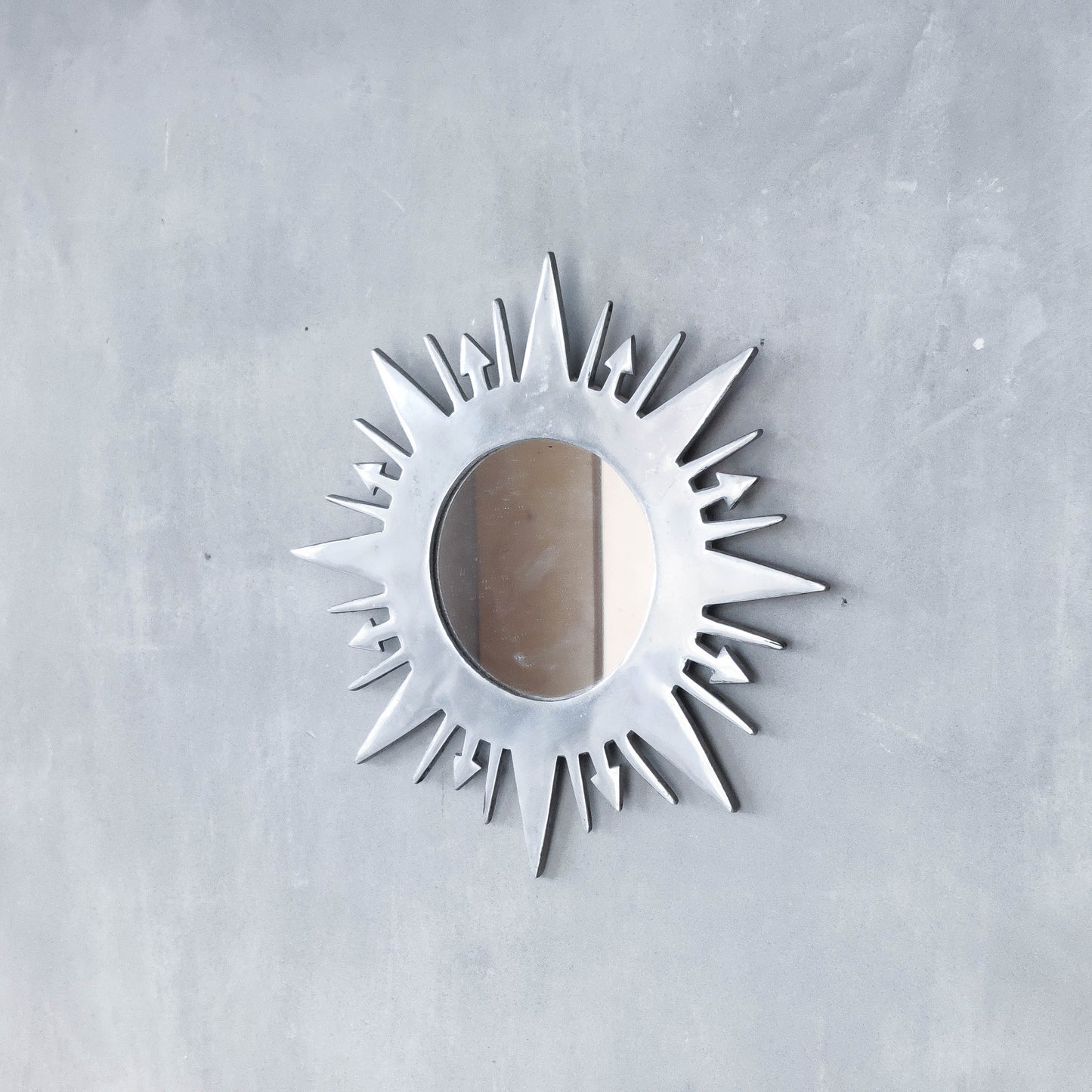 Vintage 1990s sunburst sun celestial cast aluminium silver metal wall mirror