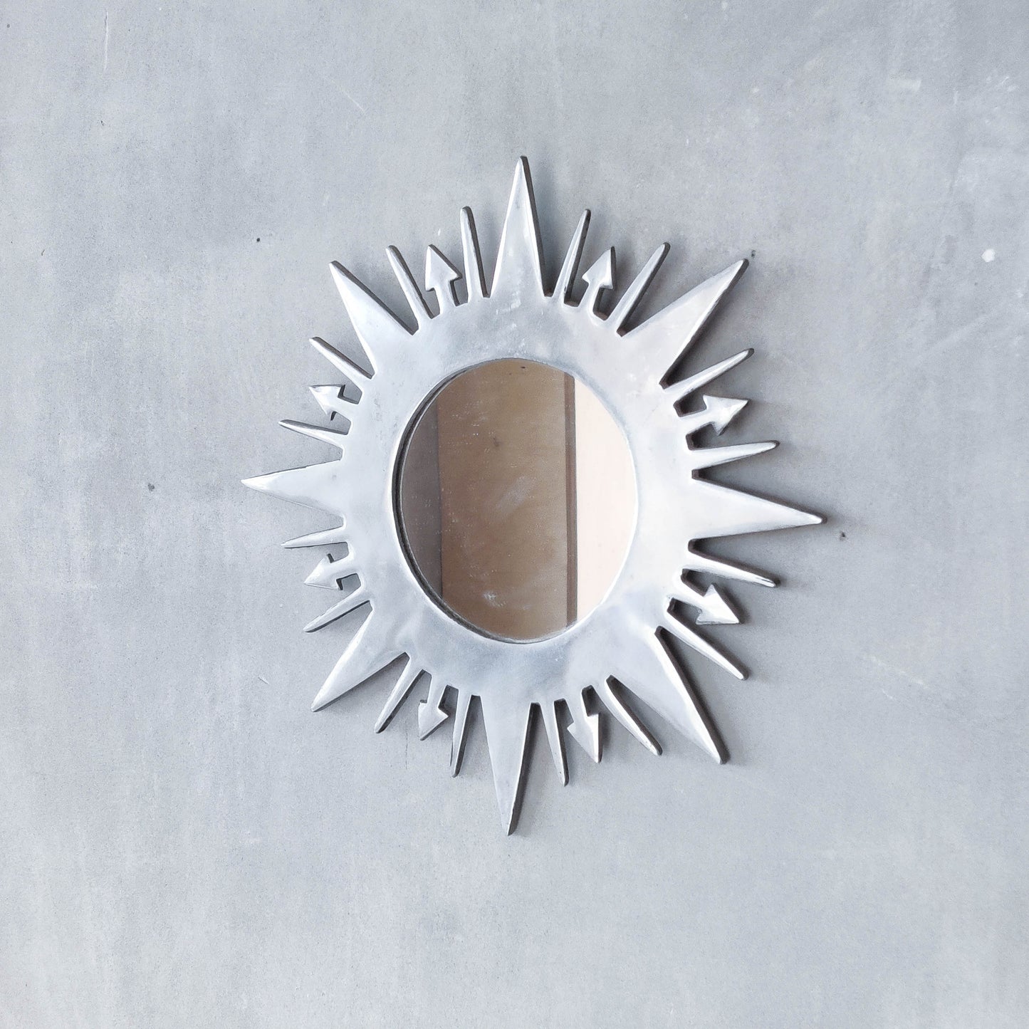 Vintage 1990s sunburst sun celestial cast aluminium silver metal wall mirror