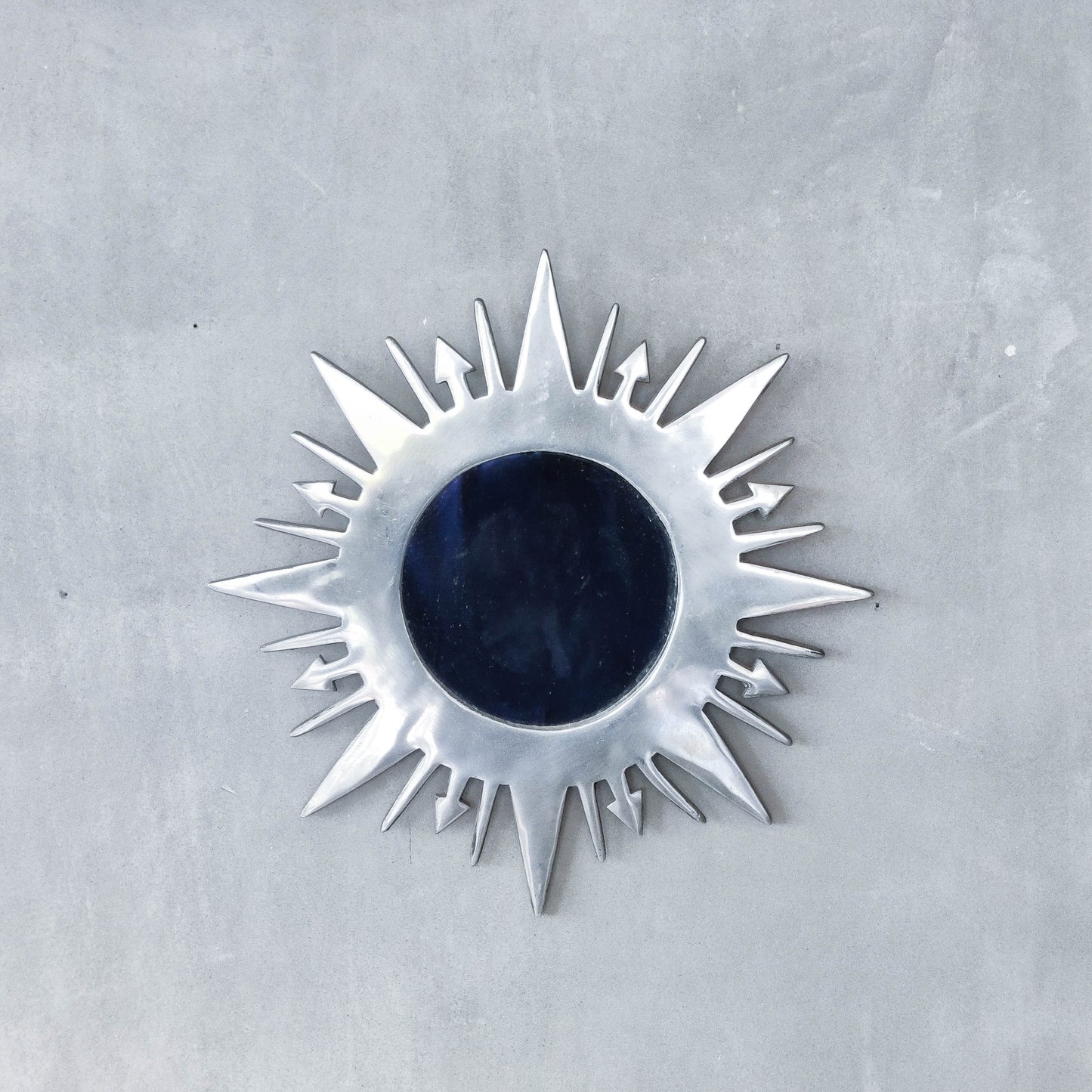 Vintage 1990s sunburst sun celestial cast aluminium silver metal wall mirror