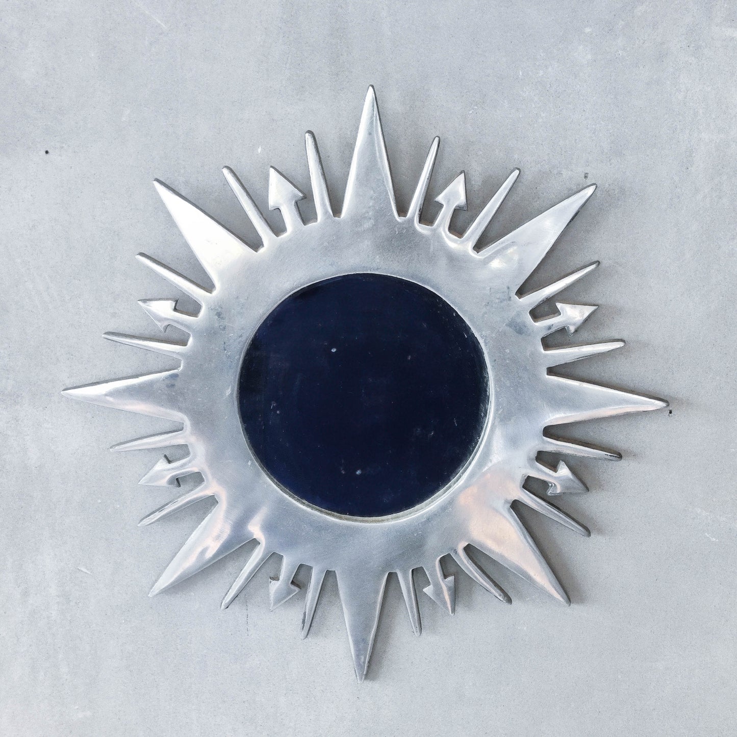 Vintage 1990s sunburst sun celestial cast aluminium silver metal wall mirror