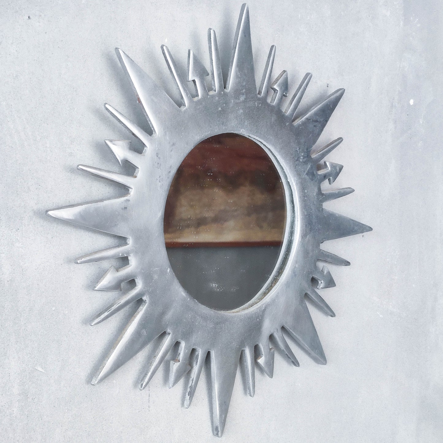 Vintage 1990s sunburst sun celestial cast aluminium silver metal wall mirror