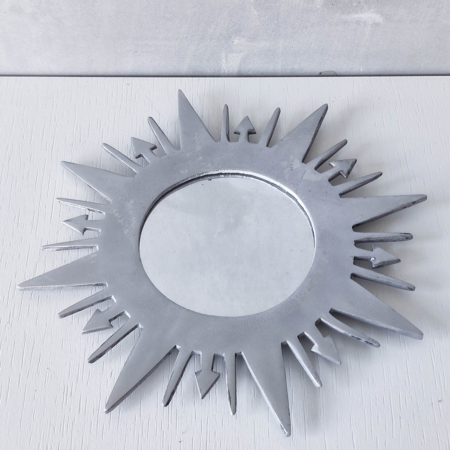Vintage 1990s sunburst sun celestial cast aluminium silver metal wall mirror