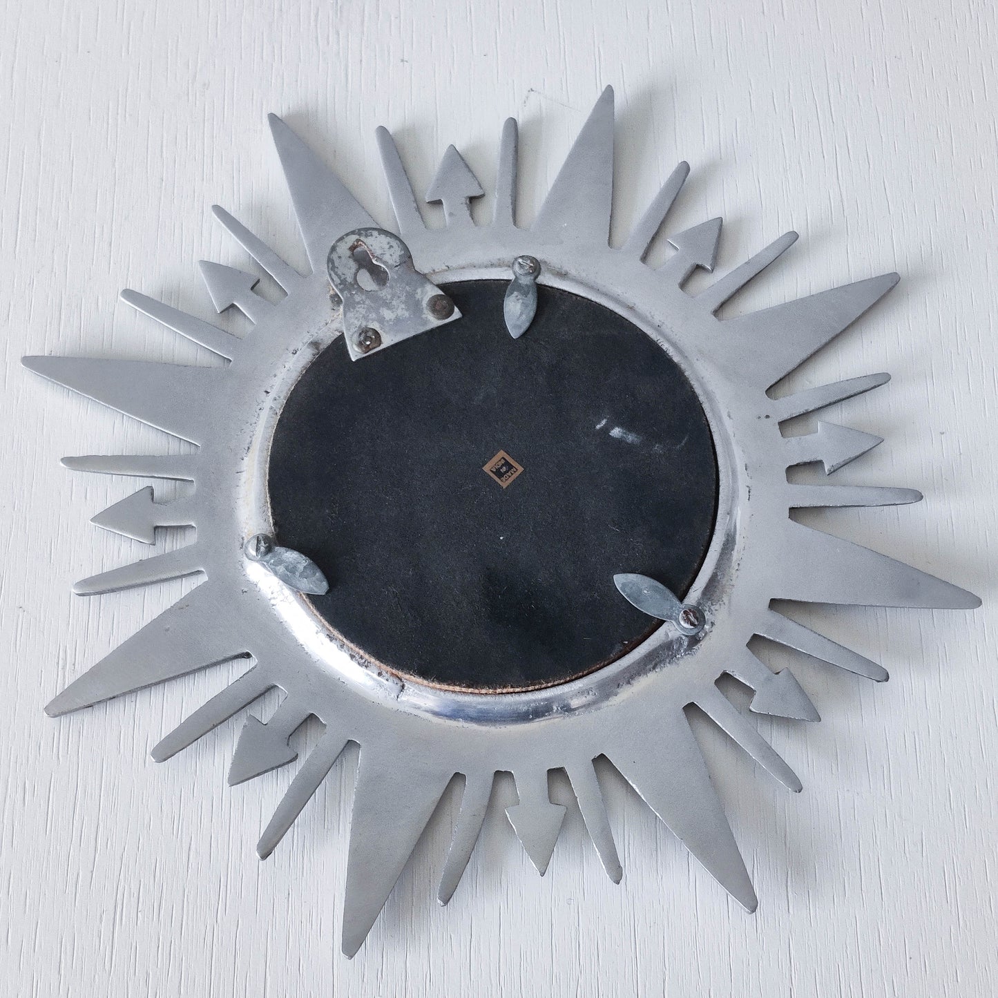 Vintage 1990s sunburst sun celestial cast aluminium silver metal wall mirror