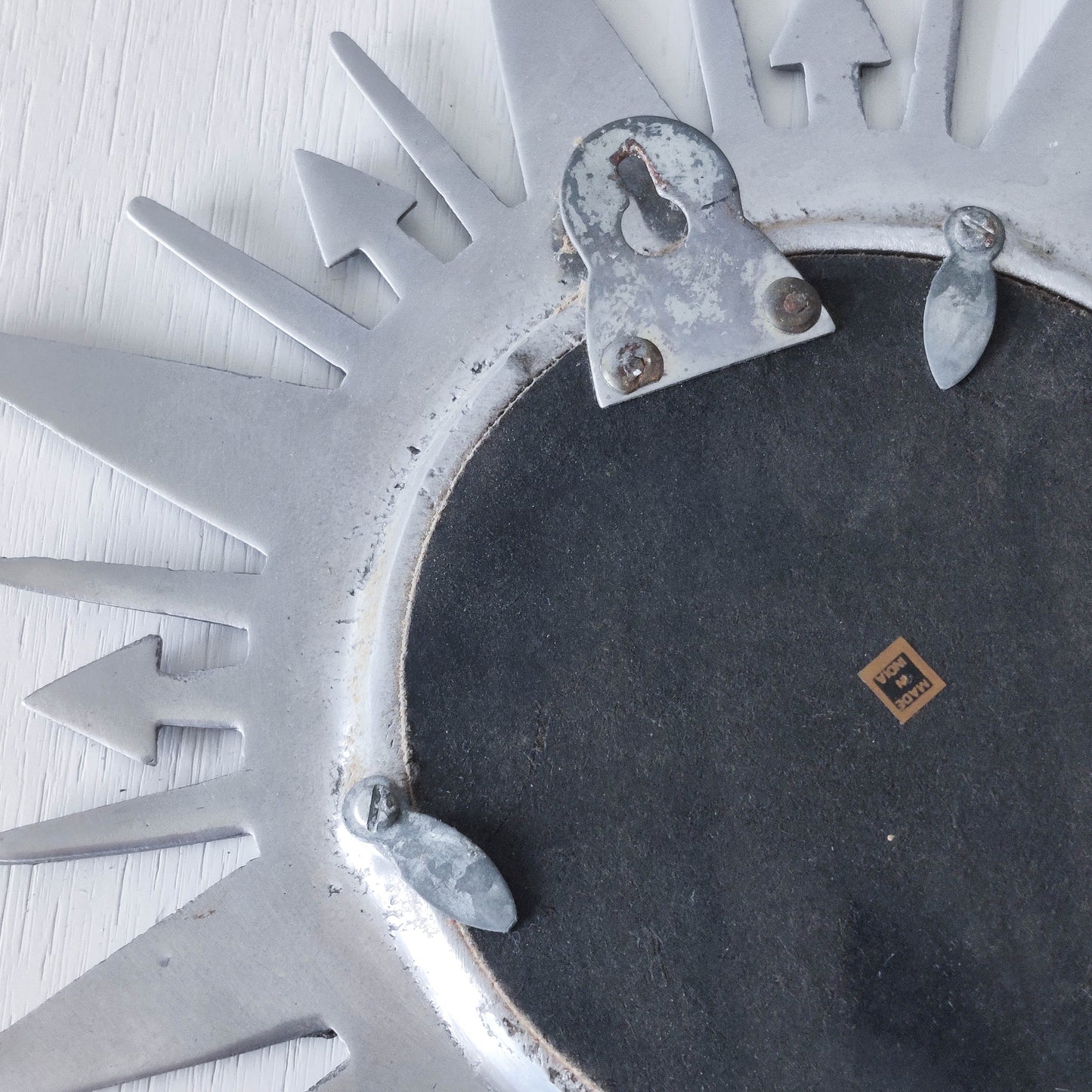 Vintage 1990s sunburst sun celestial cast aluminium silver metal wall mirror