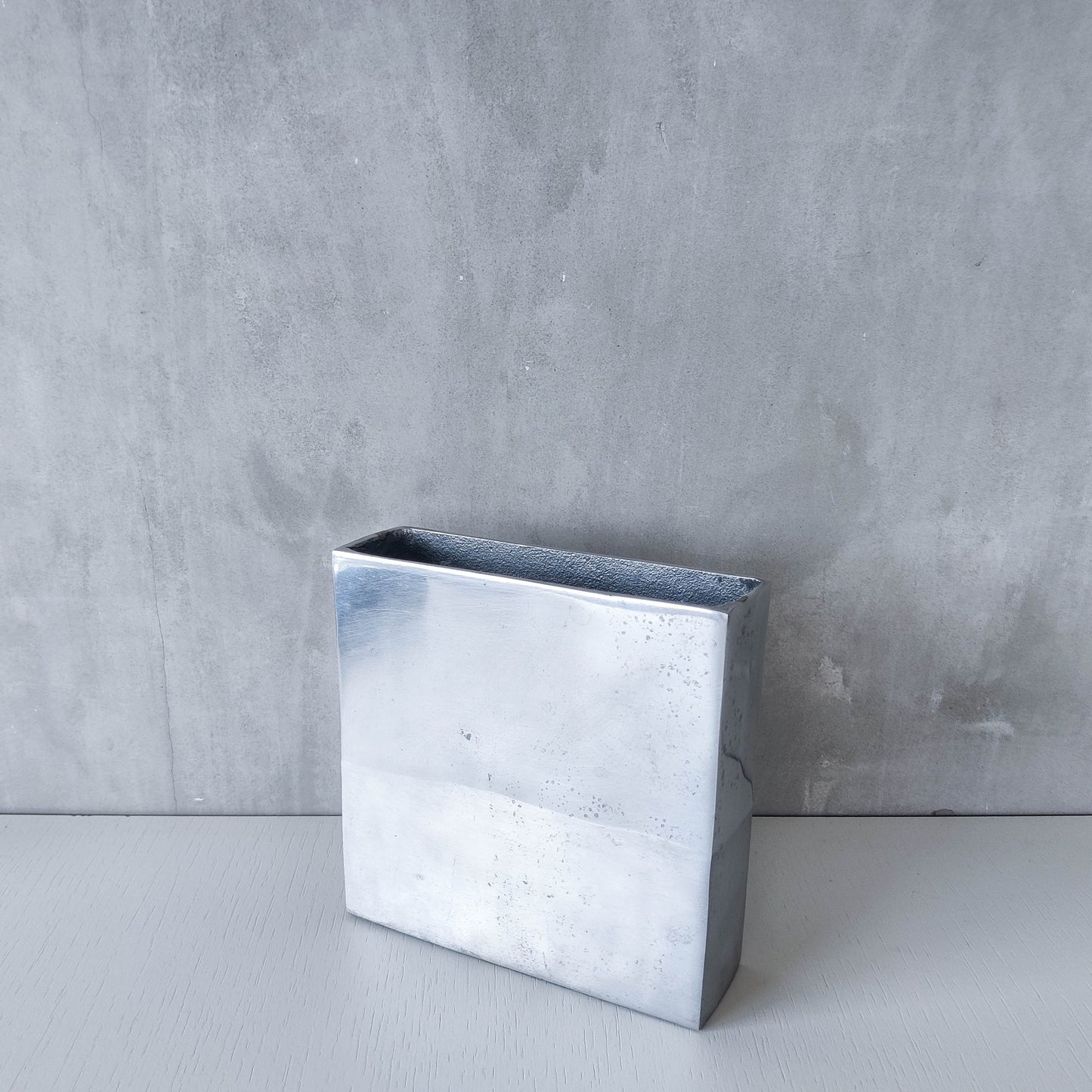 Vintage 00s modernist hand cast aluminium vase flat, sculptural silver metal