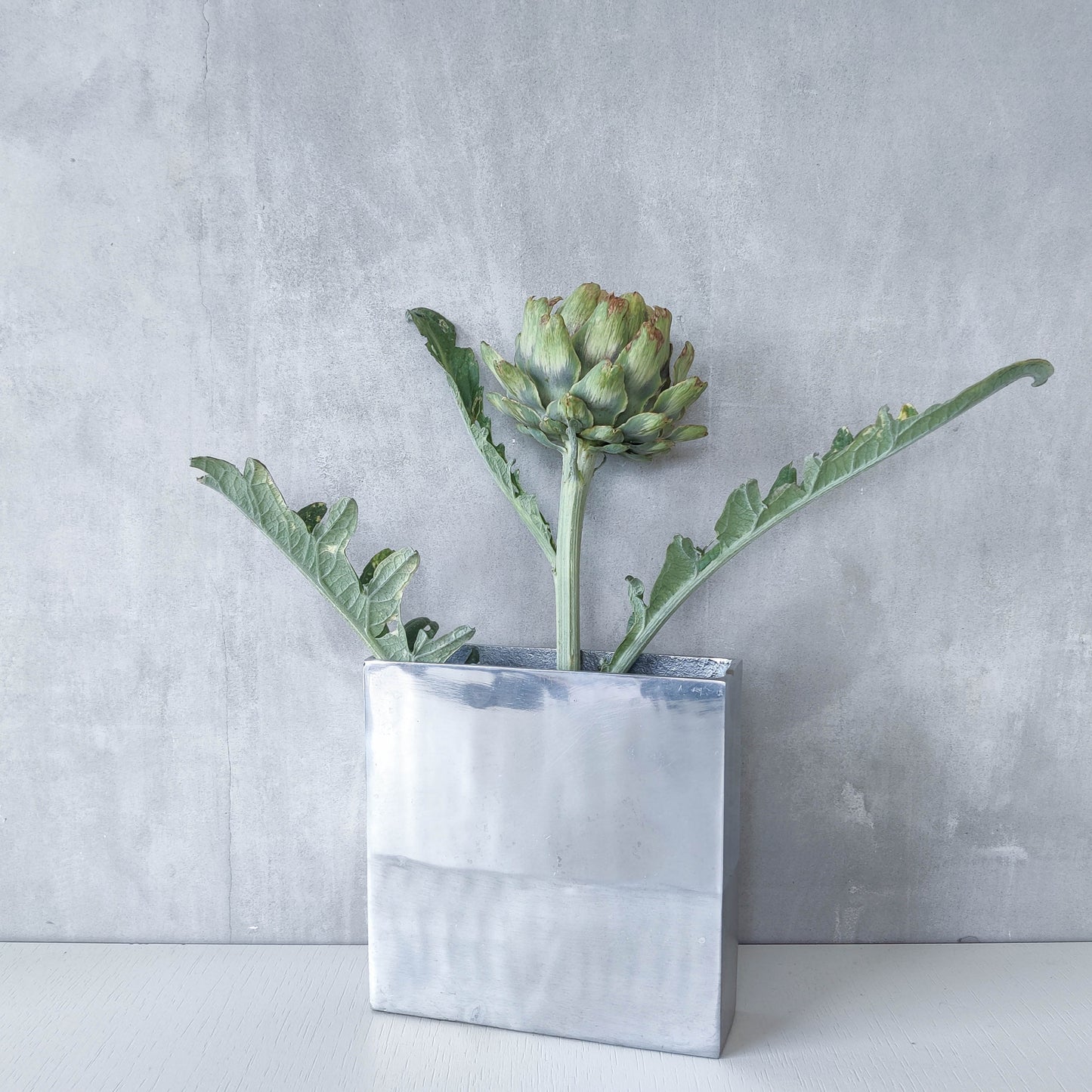 Vintage 00s modernist hand cast aluminium vase flat, sculptural silver metal