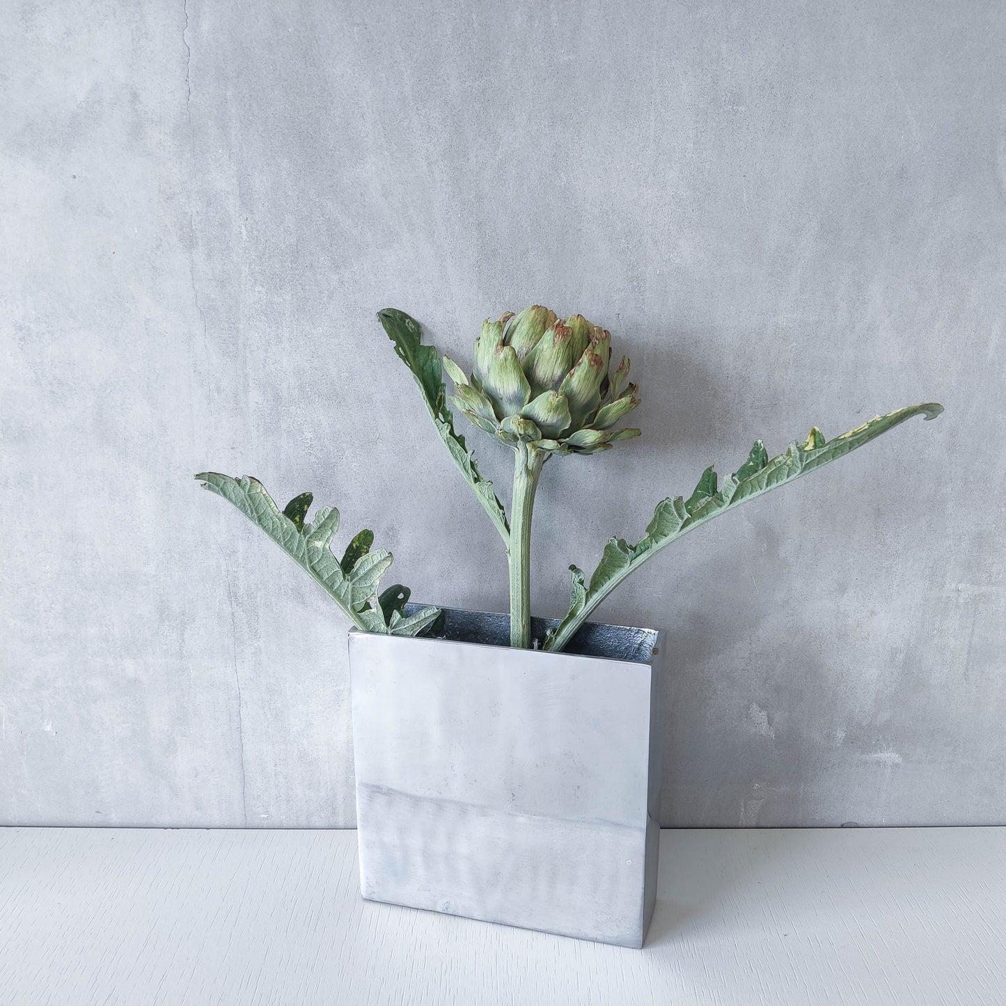 Vintage 00s modernist hand cast aluminium vase flat, sculptural silver metal