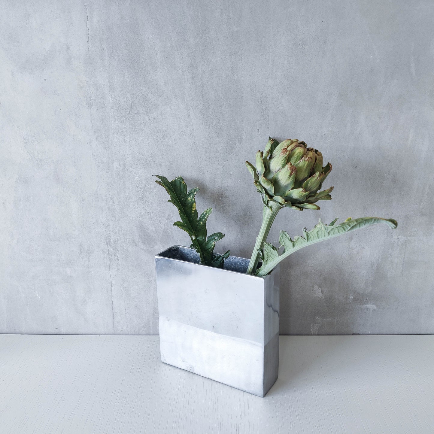 Vintage 00s modernist hand cast aluminium vase flat, sculptural silver metal