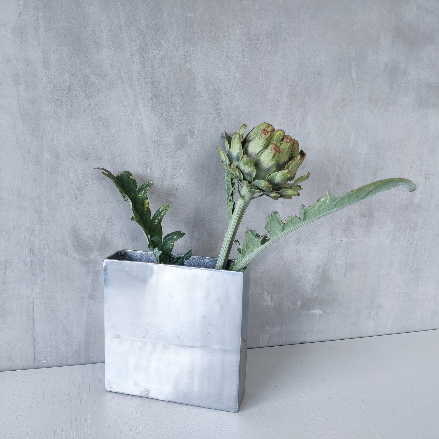 Vintage 00s modernist hand cast aluminium vase flat, sculptural silver metal