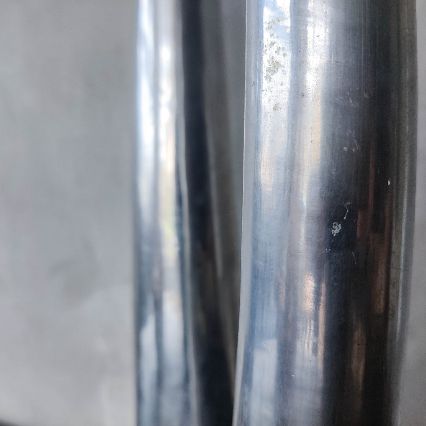 Vintage pair 90s modernist hand cast aluminium tapered organic form tall vases