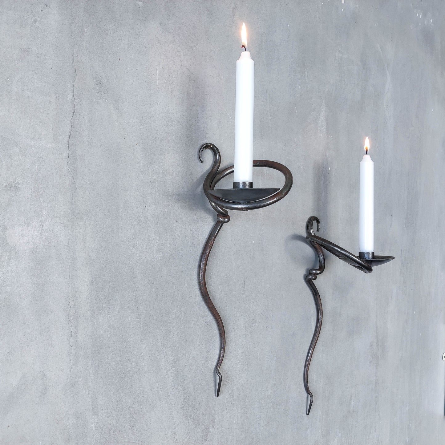 Pair of vintage hand forged blacksmith made hammered twisted steel candle sconces