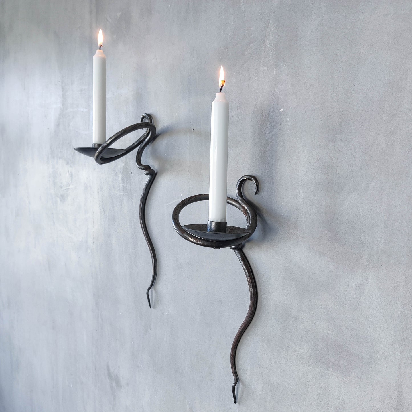Pair of vintage hand forged blacksmith made hammered twisted steel candle sconces