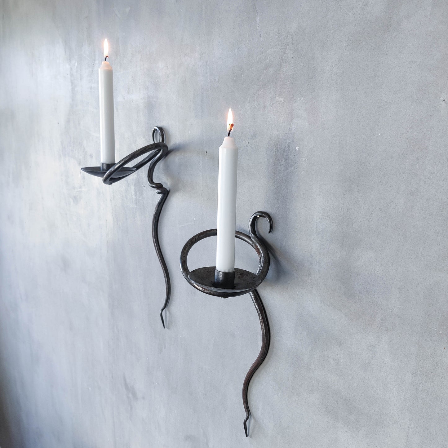 Pair of vintage hand forged blacksmith made hammered twisted steel candle sconces