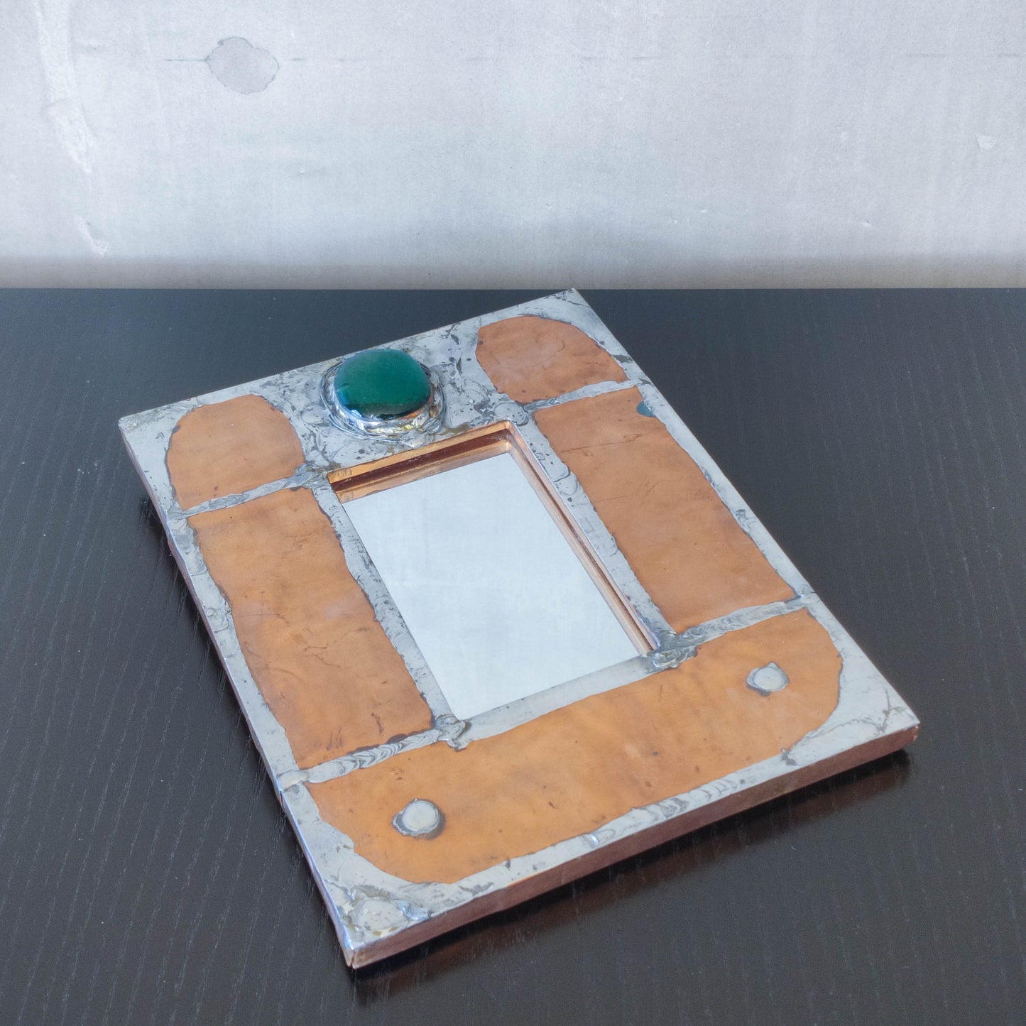 Vintage Arts & Crafts style metalwork welded copper mirror with Ruskin cabochon