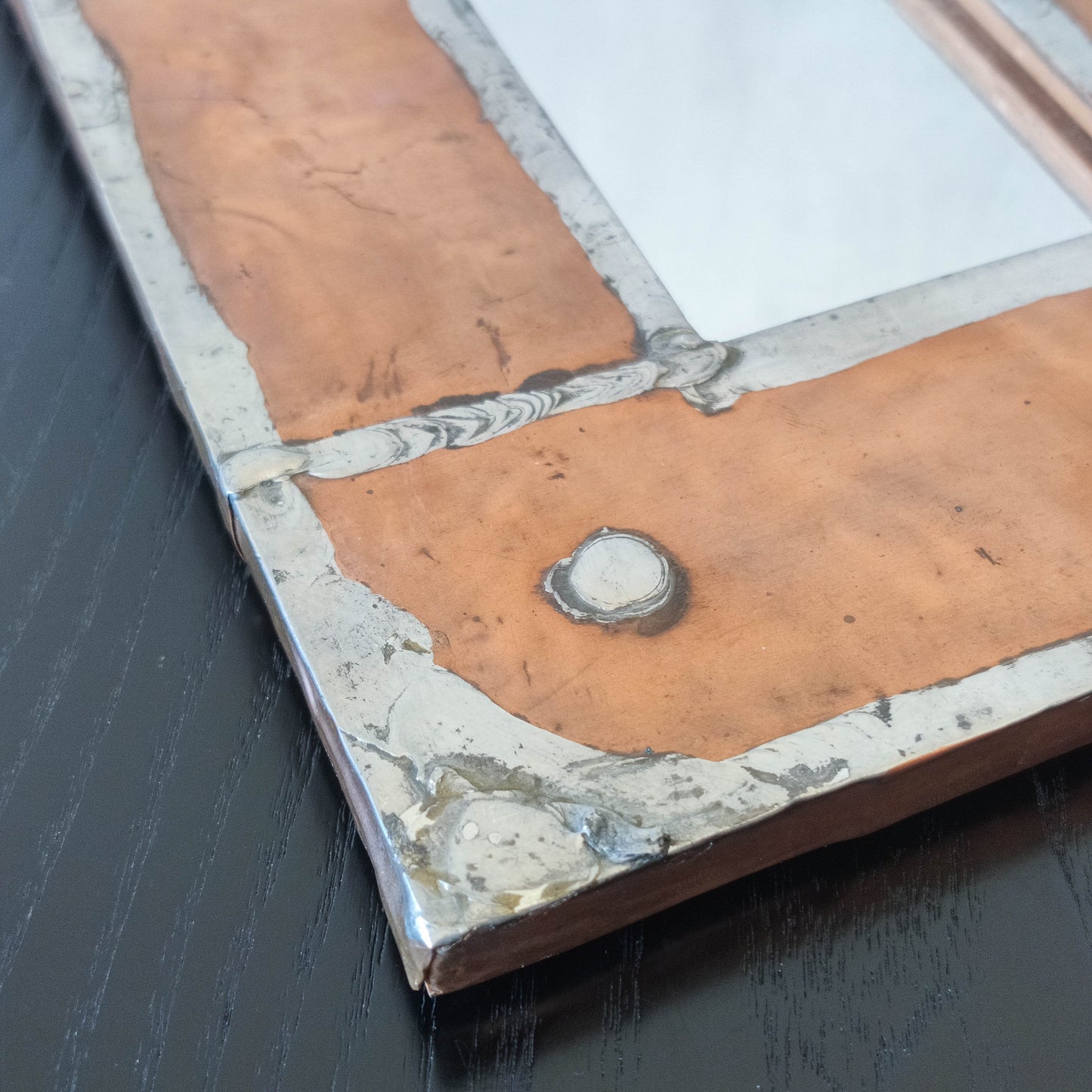 Vintage Arts & Crafts style metalwork welded copper mirror with Ruskin cabochon