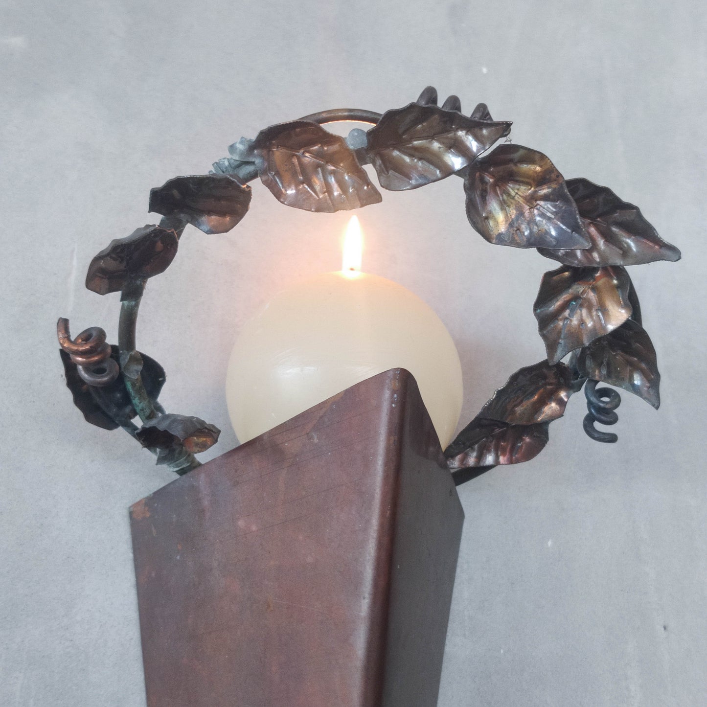 Artisan fabricated copper sculptural pyramid metalwork candle sconce leaf wreath