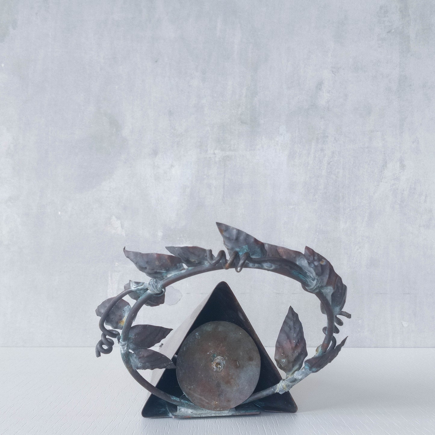 Artisan fabricated copper sculptural pyramid metalwork candle sconce leaf wreath