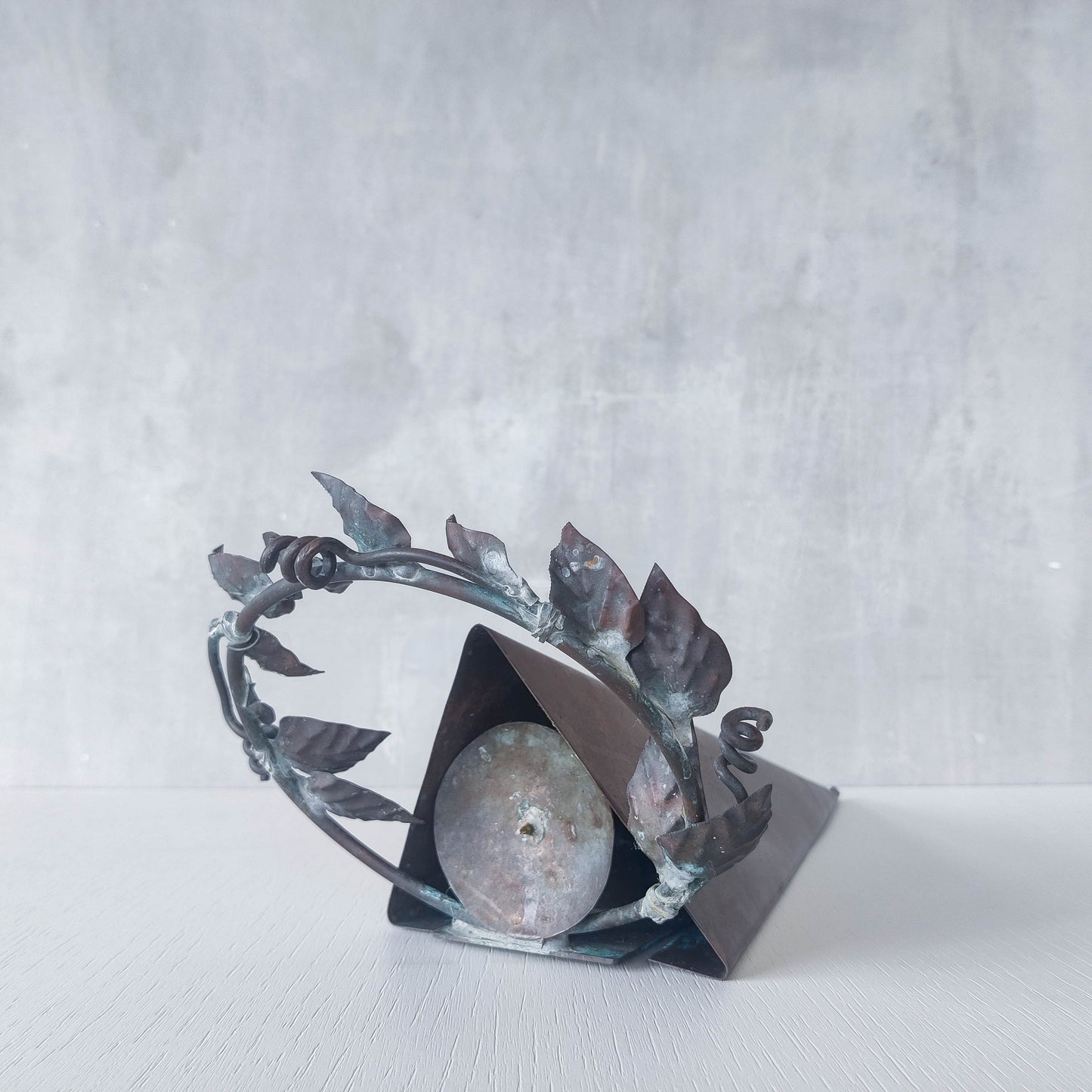 Artisan fabricated copper sculptural pyramid metalwork candle sconce leaf wreath