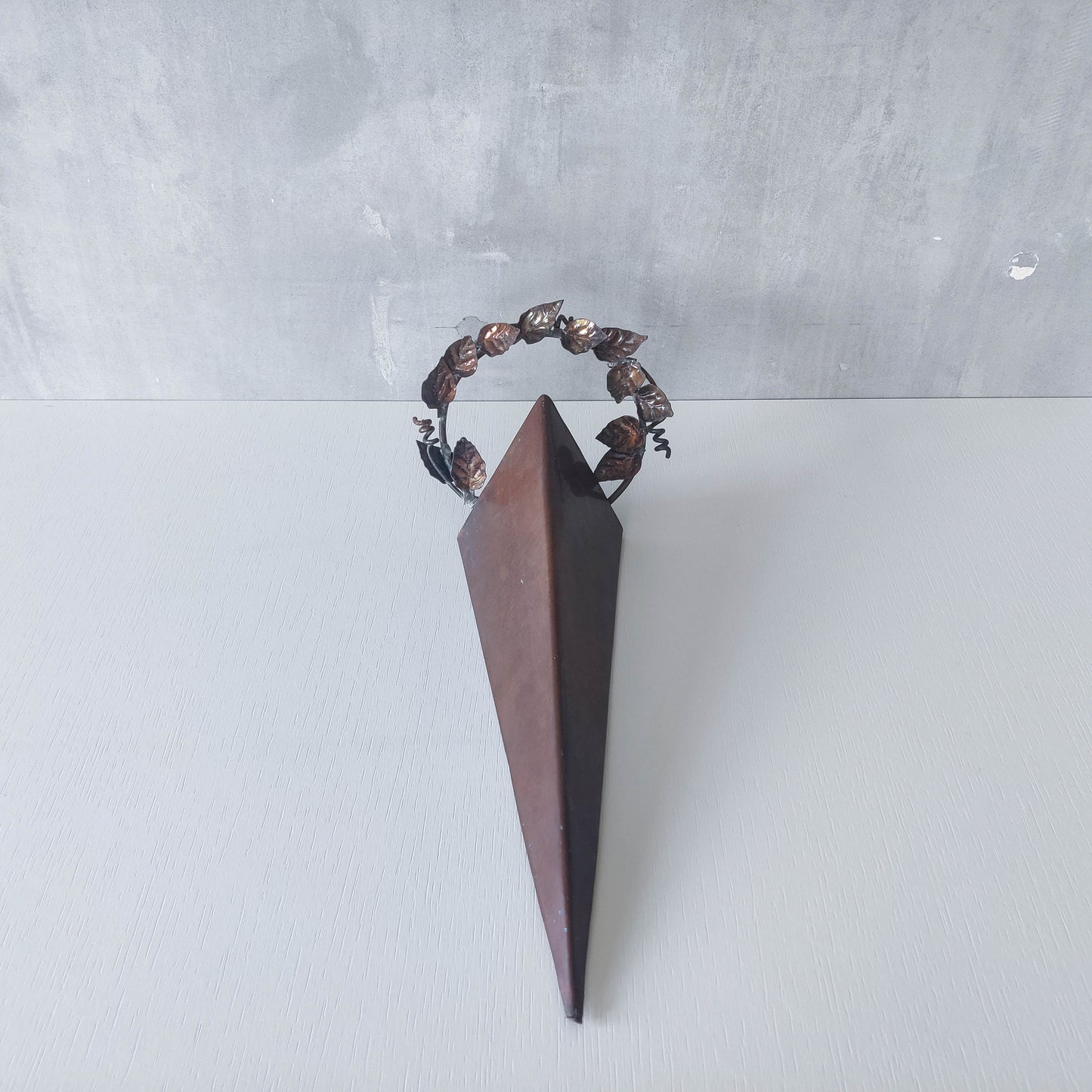 Artisan fabricated copper sculptural pyramid metalwork candle sconce leaf wreath
