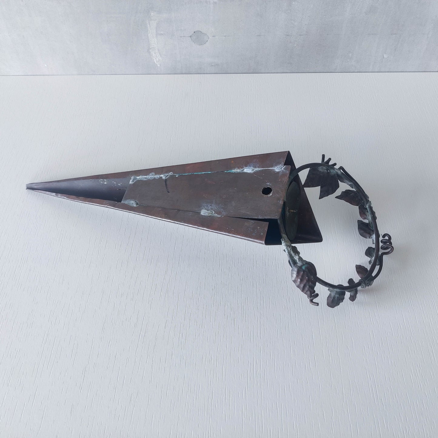 Artisan fabricated copper sculptural pyramid metalwork candle sconce leaf wreath