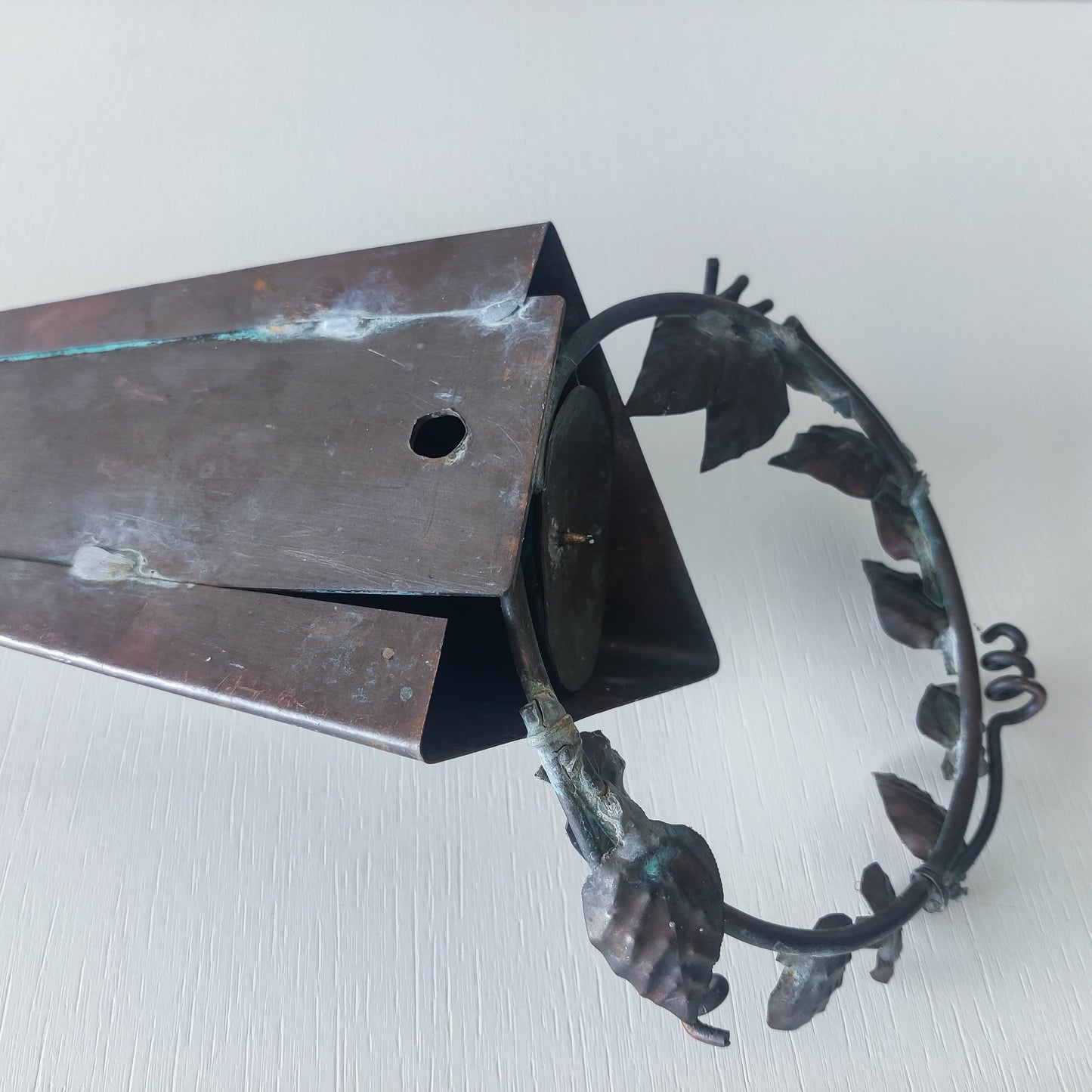 Artisan fabricated copper sculptural pyramid metalwork candle sconce leaf wreath
