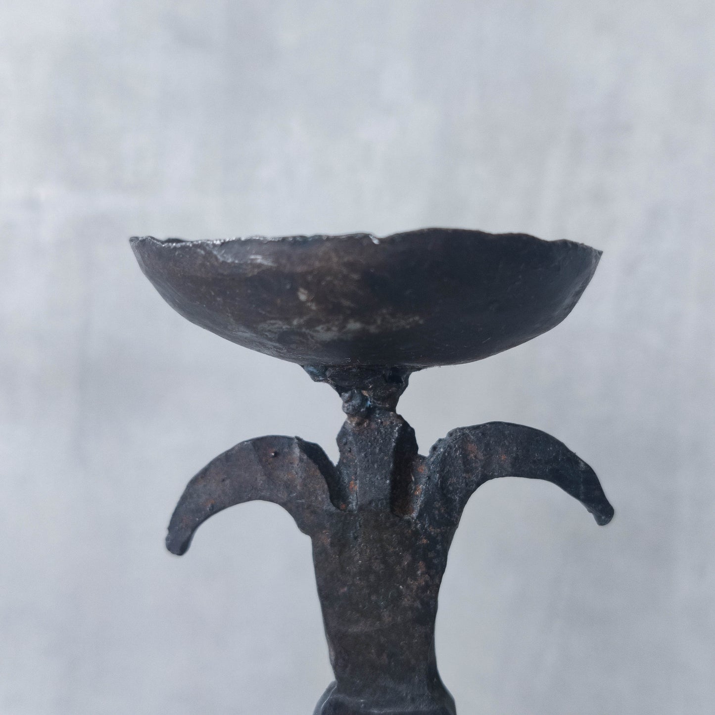 Pair of vintage hand forged wrought iron blacksmith made candle holders crude style