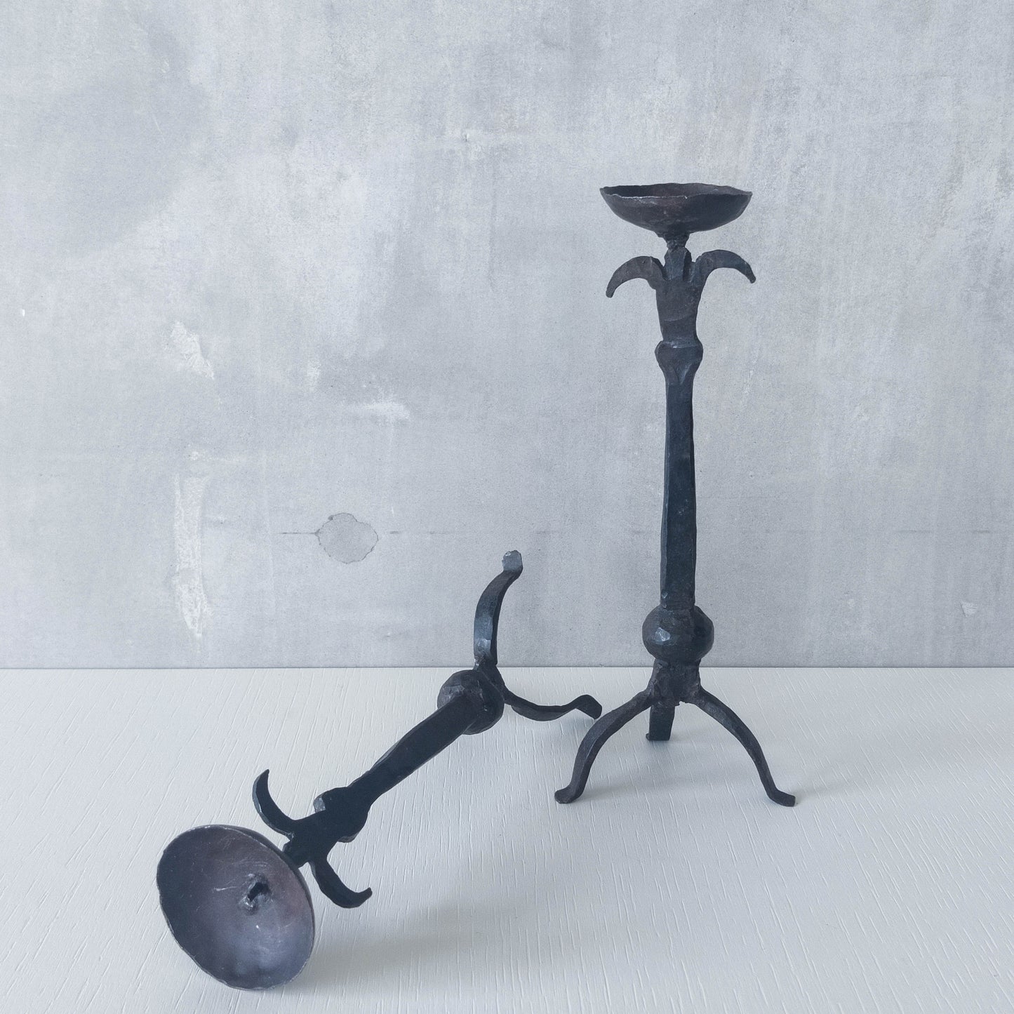 Pair of vintage hand forged wrought iron blacksmith made candle holders crude style