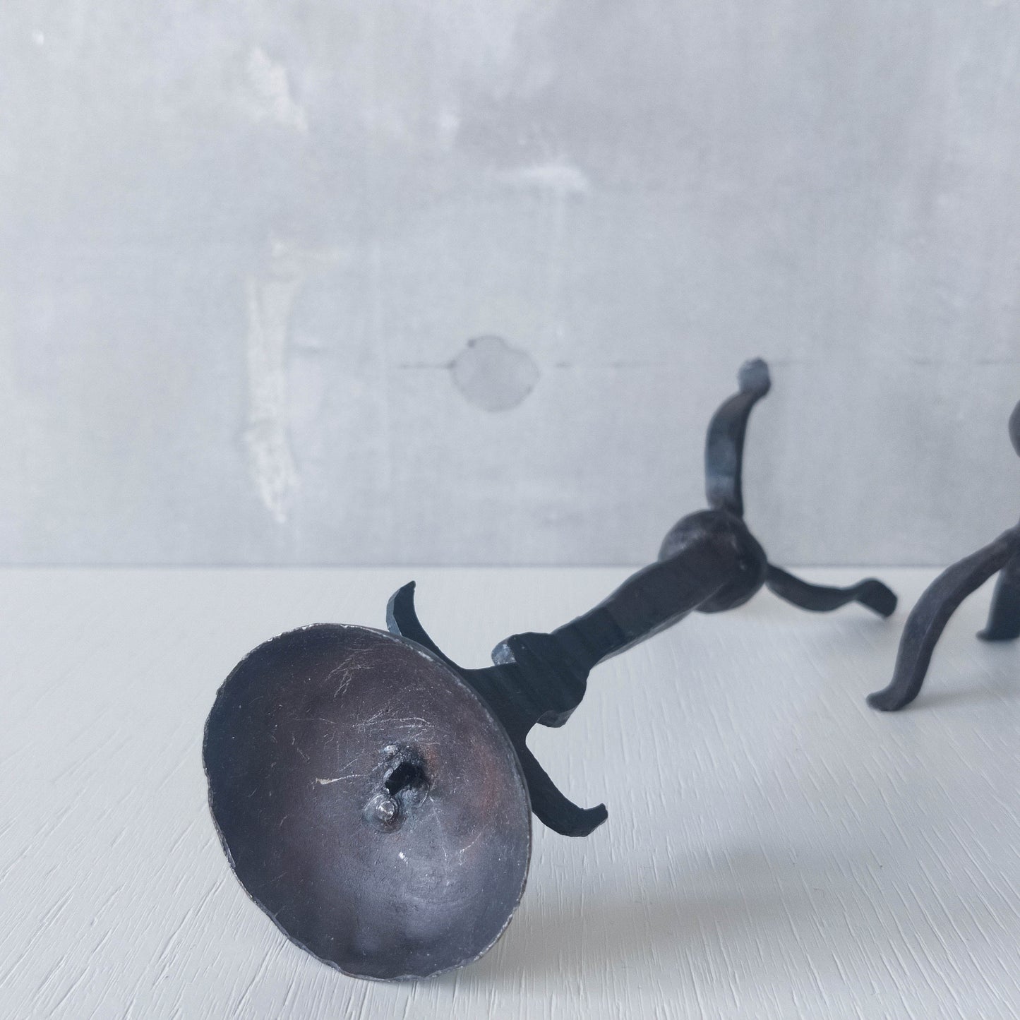 Pair of vintage hand forged wrought iron blacksmith made candle holders crude style