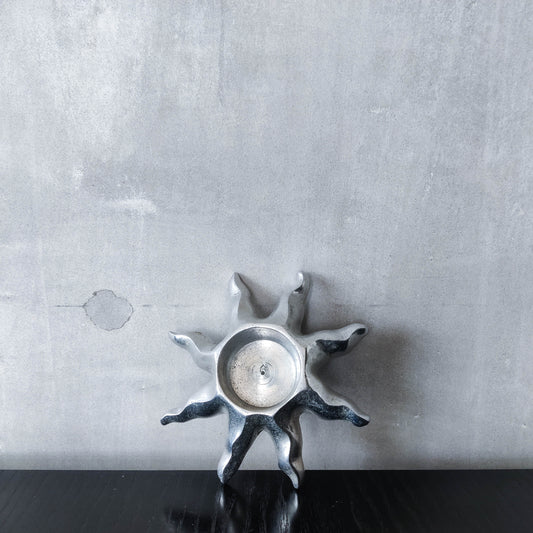 Vintage hand cast aluminium sculptural sun celestial tea light holder silver