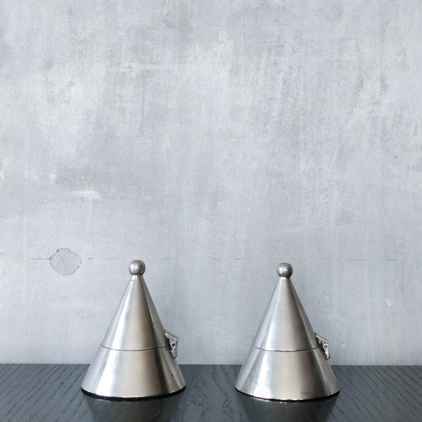 Pair of vintage conical silver chrome tea light holders Aldo Rossi Alessi modernist