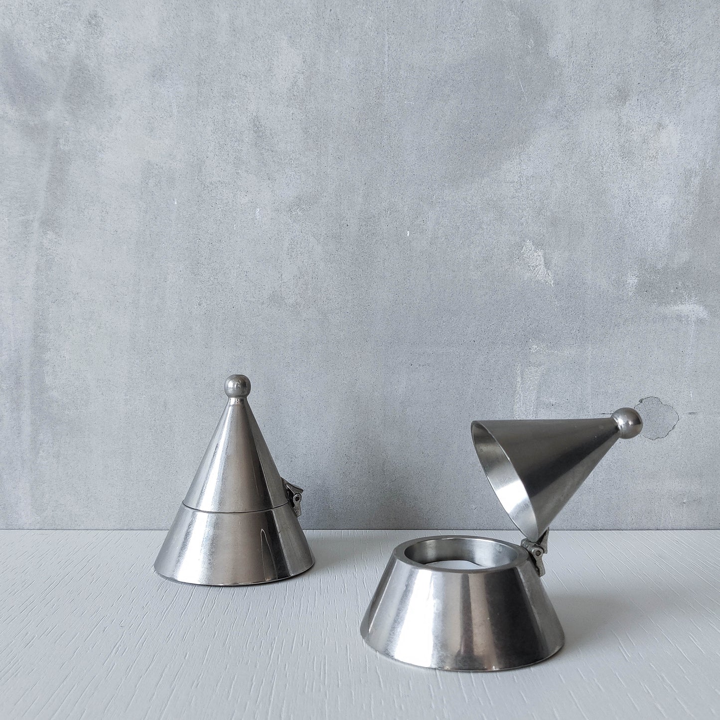 Pair of vintage conical silver chrome tea light holders Aldo Rossi Alessi modernist
