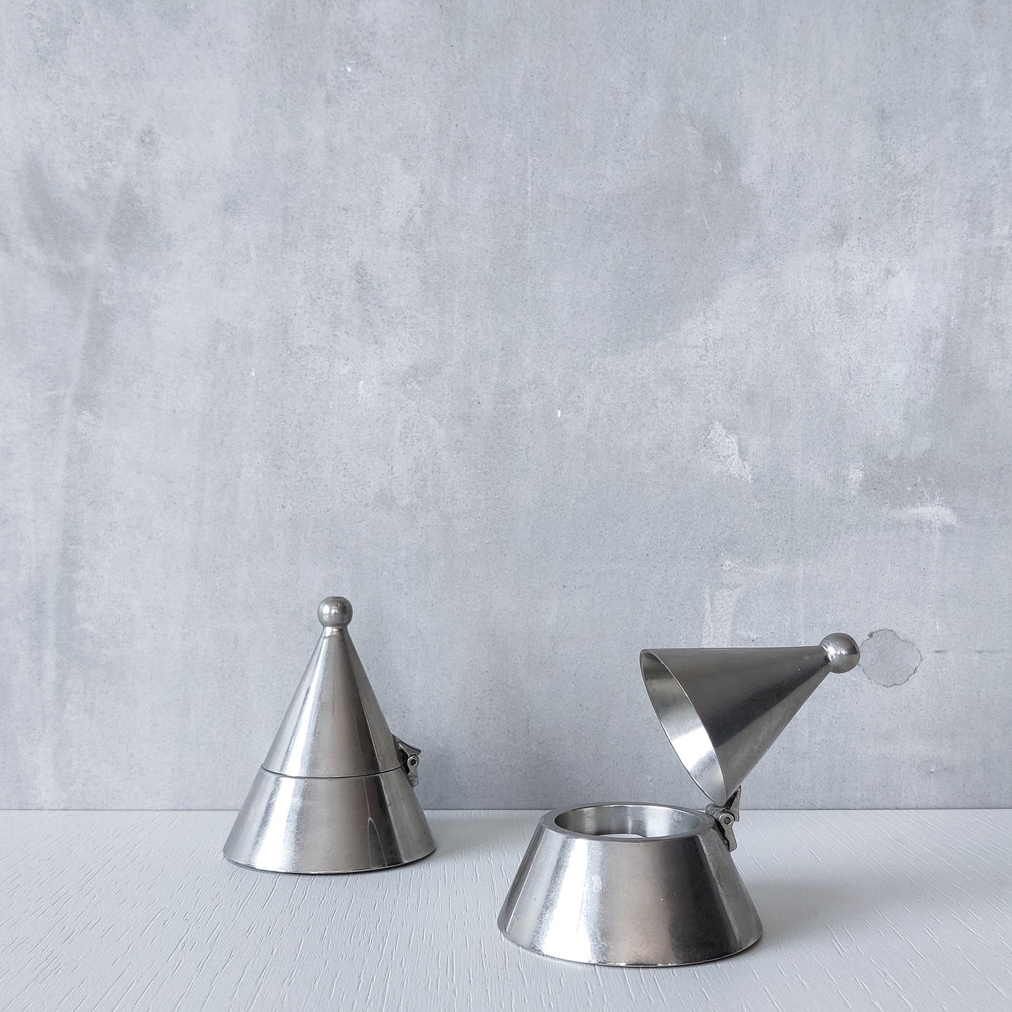 Pair of vintage conical silver chrome tea light holders Aldo Rossi Alessi modernist