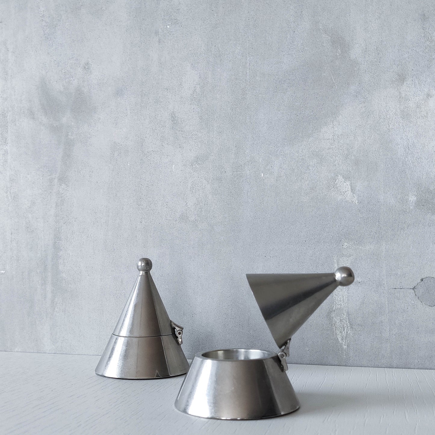 Pair of vintage conical silver chrome tea light holders Aldo Rossi Alessi modernist
