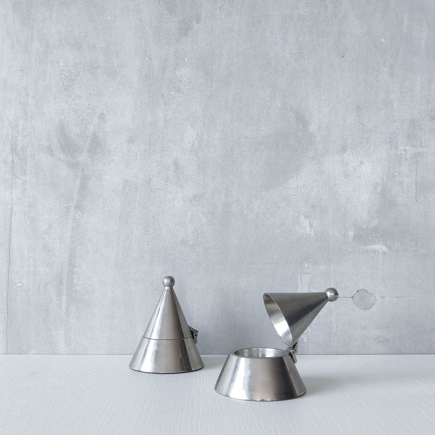 Pair of vintage conical silver chrome tea light holders Aldo Rossi Alessi modernist