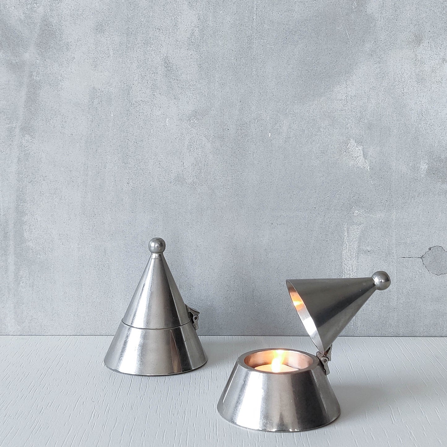 Pair of vintage conical silver chrome tea light holders Aldo Rossi Alessi modernist