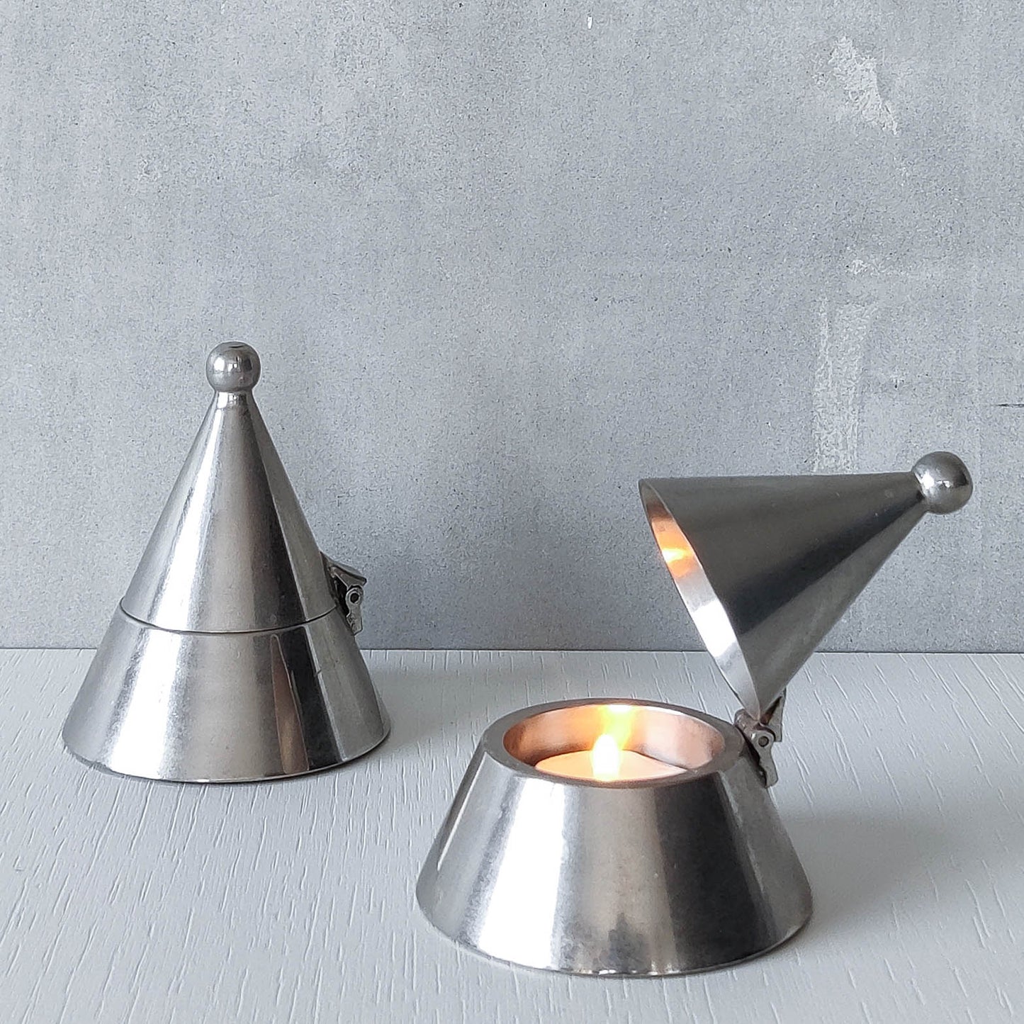 Pair of vintage conical silver chrome tea light holders Aldo Rossi Alessi modernist