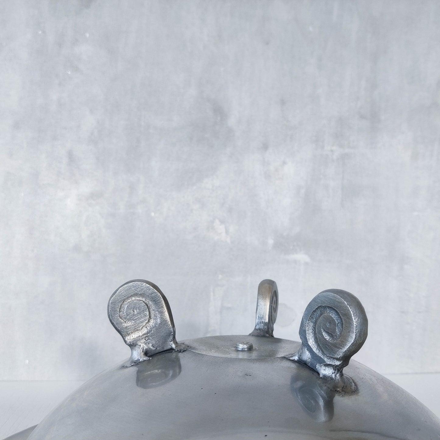 Vintage cast aluminium silver fruit bowl centerpiece with spiral feet footed