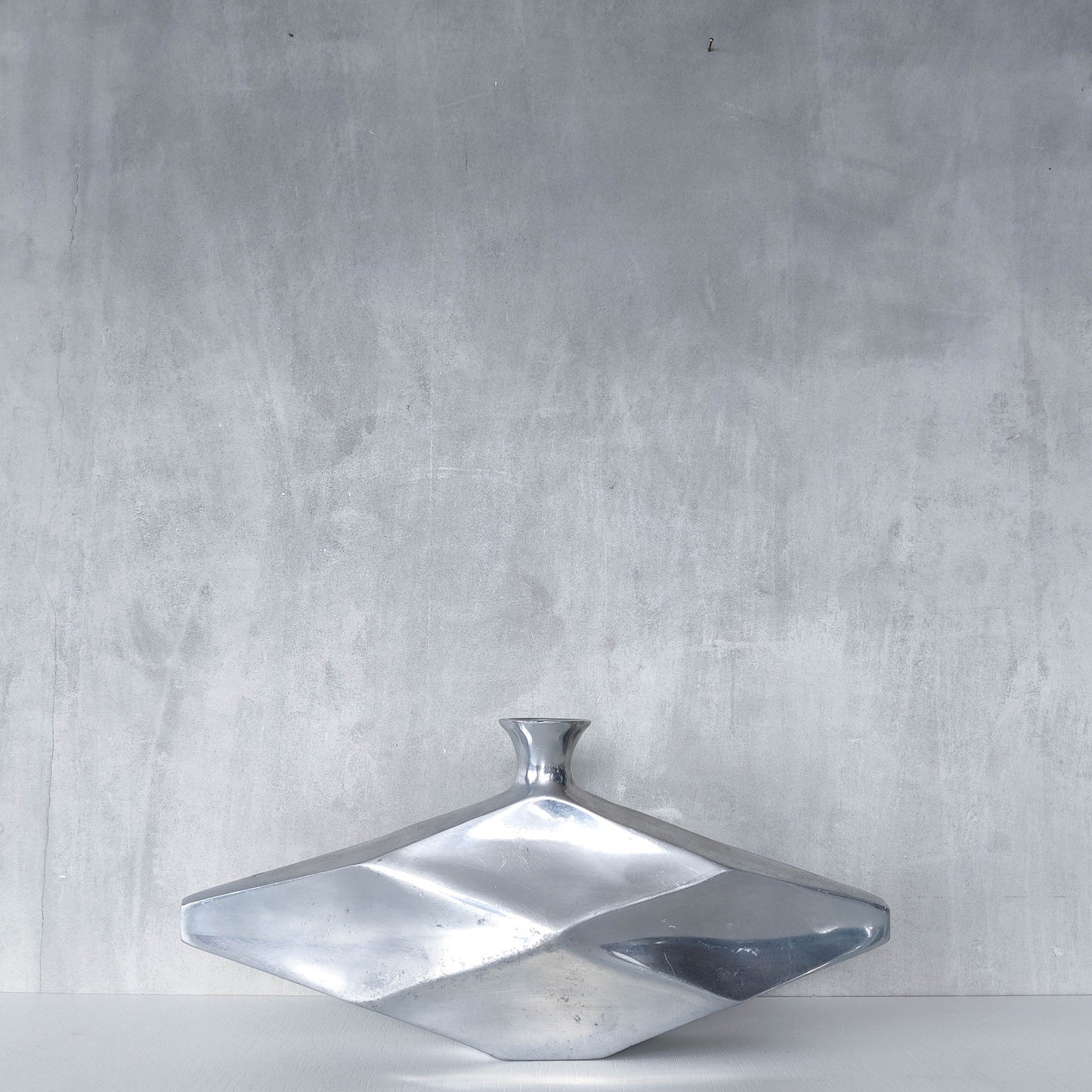 Vintage 1990s hand cast aluminium modernist sculptural vessel faceted vase form