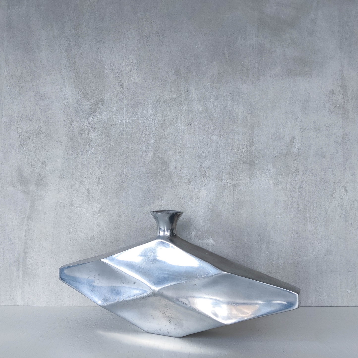 Vintage 1990s hand cast aluminium modernist sculptural vessel faceted vase form