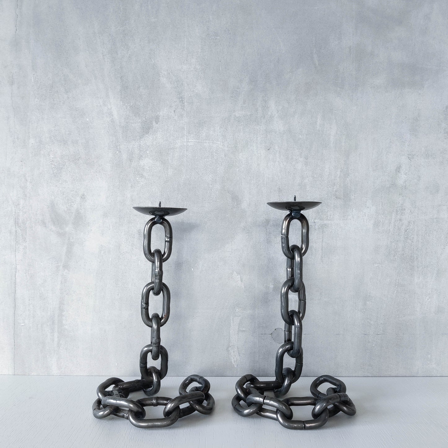 Pair of brutalist heavy hand welded steel chain link sculptural candle holders