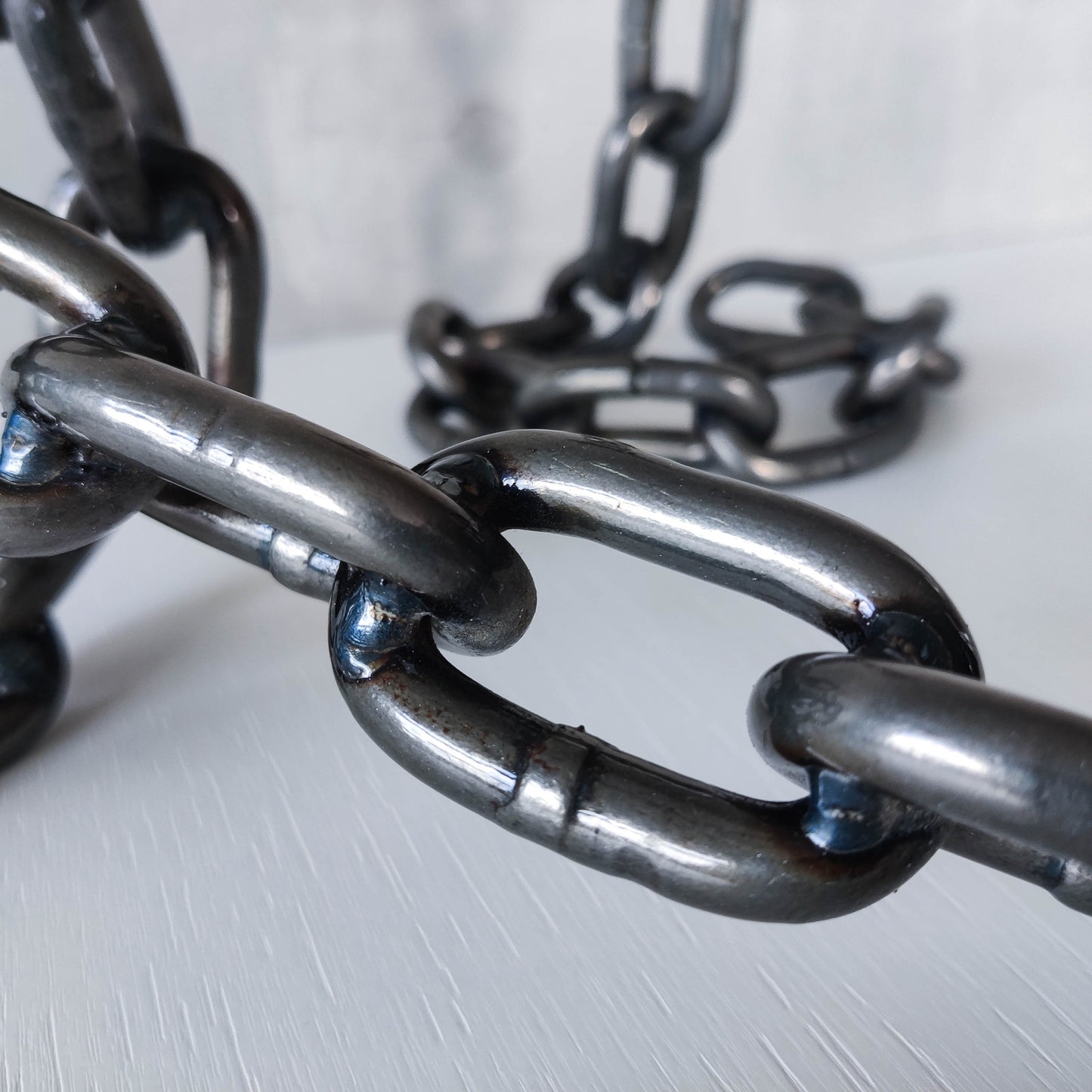 Pair of brutalist heavy hand welded steel chain link sculptural candle holders