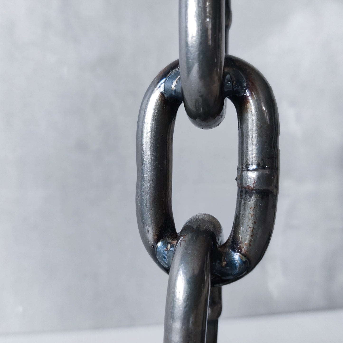 Pair of brutalist heavy hand welded steel chain link sculptural candle holders