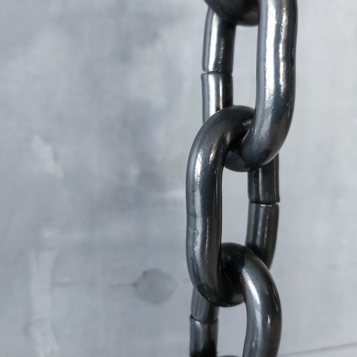 Pair of brutalist heavy hand welded steel chain link sculptural candle holders