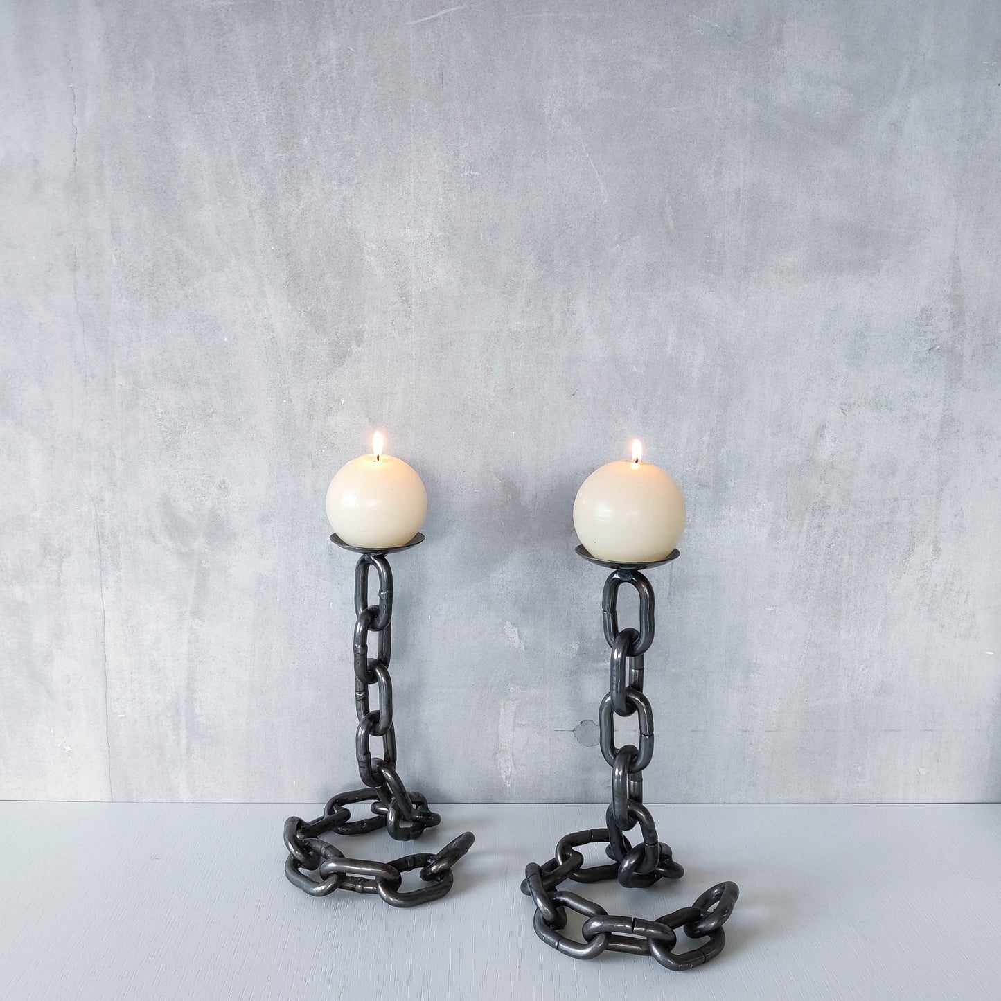 Pair of brutalist heavy hand welded steel chain link sculptural candle holders